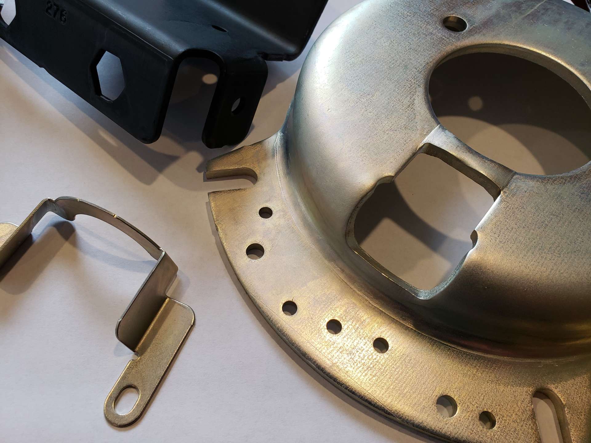 Black and clear chromate finish parts